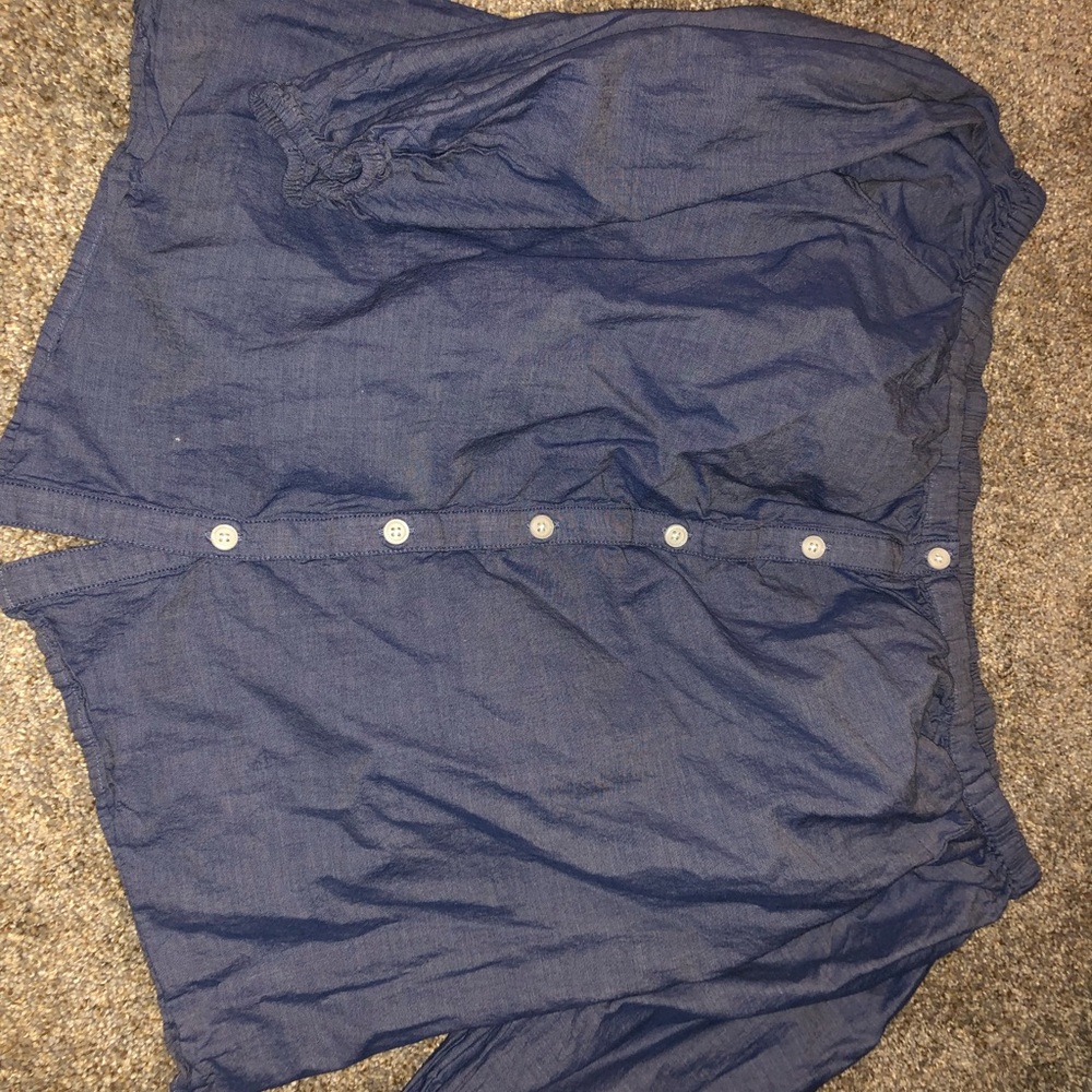 Denim colored off the shoulder button top